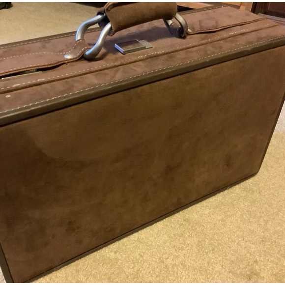 Hartmann vintage brown suede carry on suit bag.